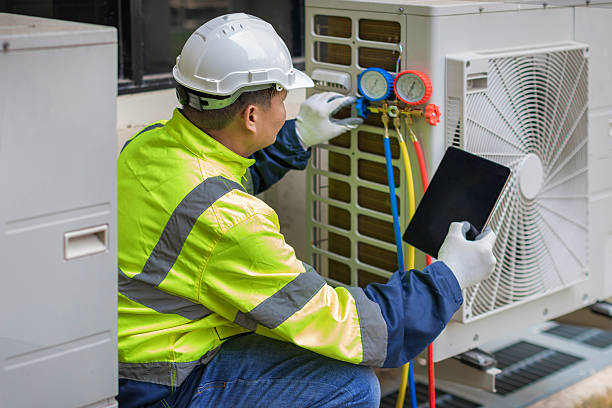 Professional Air Conditioning Repair technician working in Buckland, OH
